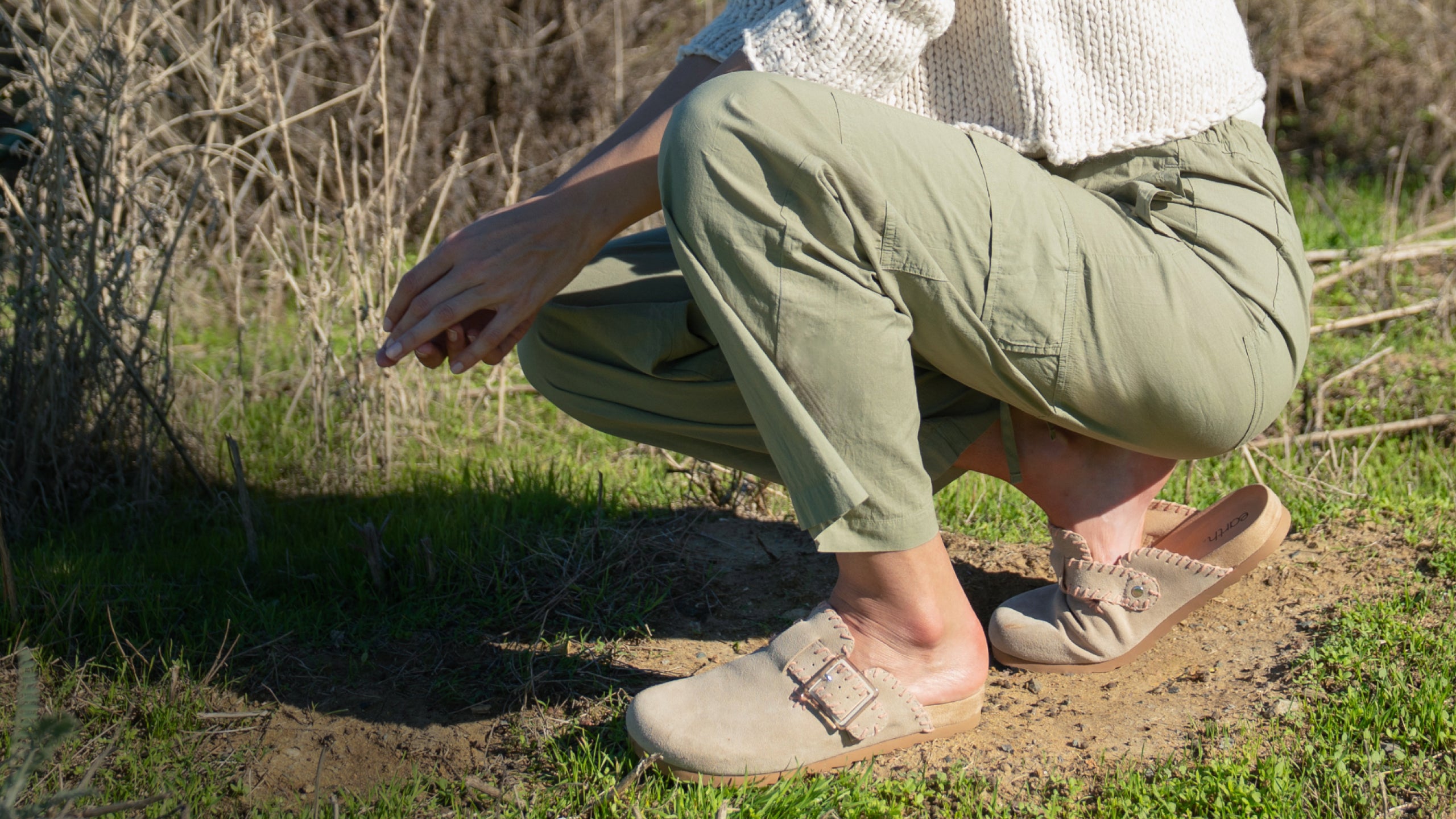 Model wearing Earth Shoes leather clogs 