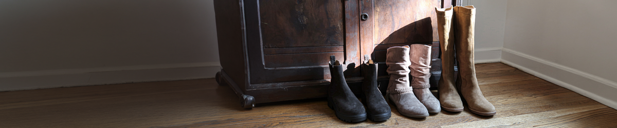 Promotional banner featuring new arrival boots and booties