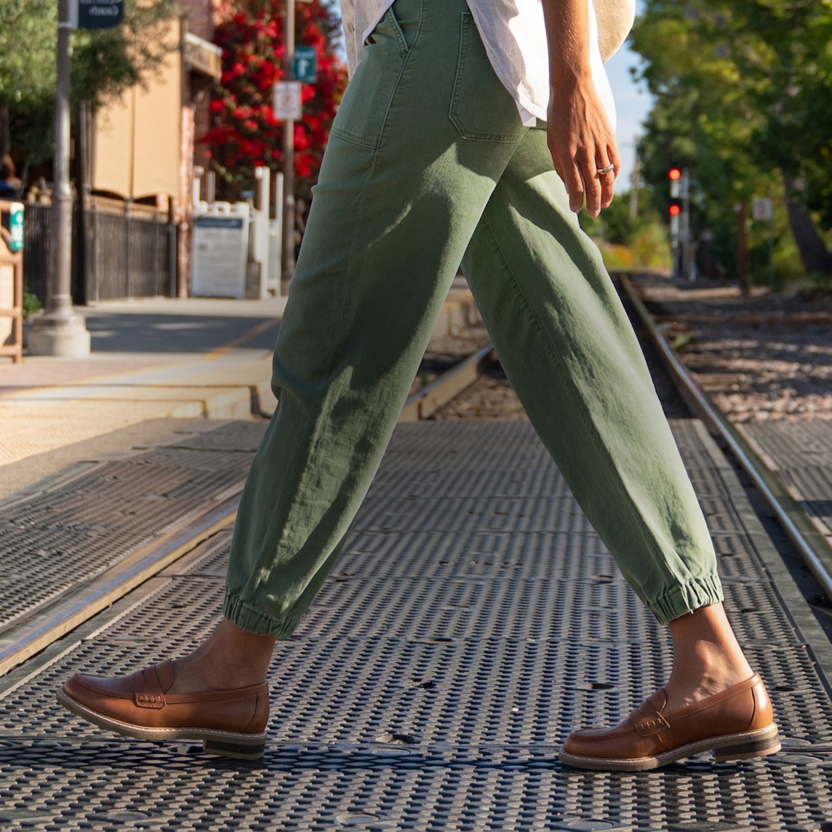 Model wearing Earth Origins Java Slip-on Penny loafers